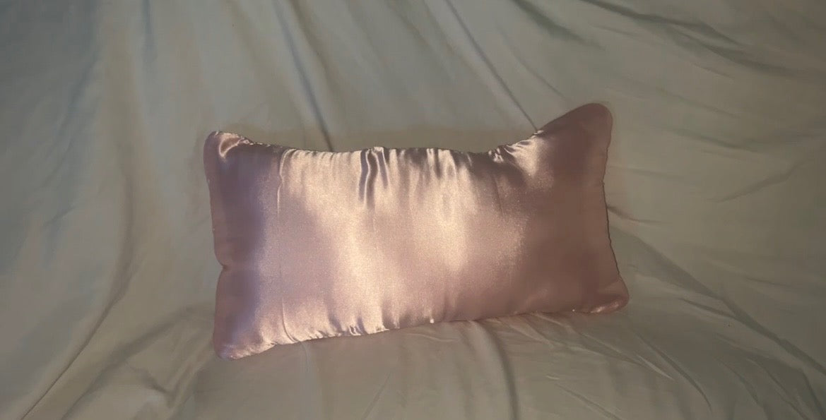 Small pink neck pillow